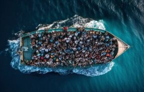 Photographie de migrants sur un bateau